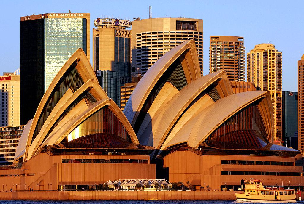 The Sydney Opera House in front of a city skyline. (GREG WOOD/AFP/Getty Images)