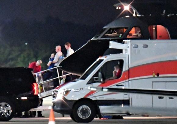 A person believed to be Otto Warmbier is transferred from a medical transport airplane to an awaiting ambulance at Lunken Airport in Cincinnati, Ohio, U.S., June 13, 2017. (Bryan Woolston/Reuters)