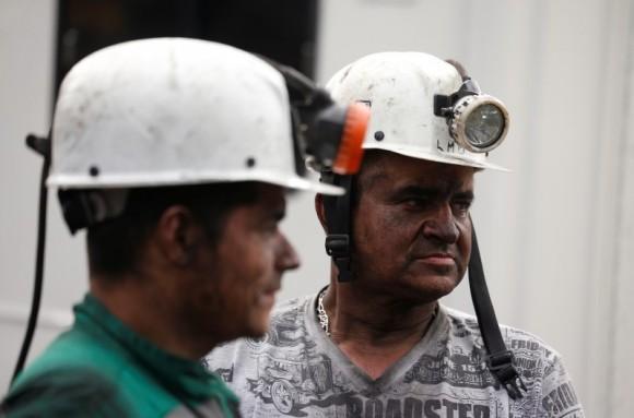 Rescue personnel look on as they coordinate to search for missing miners after an explosion at an underground coal mine on Friday, in Cucunuba, Colombia June 24, 2017. (Reuters/Jaime Saldarriaga)