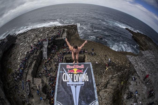 Blake Aldridge of the UK dives from the 90 foot platform at the Serpent`s Lair during the first stop of the Red Bull Cliff Diving World Series Inis Mor, Ireland, on June 25. (Romina Amato/Red Bull via Getty Images)