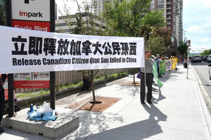 Falun Gong practitioners gather in front of the Chinese Consulate in Calgary on June 26, 2017, to appeal for the release of Canadian citizen Sun Qian, who has been detained in China since Feb. 19 for her faith in Falun Gong. (The Epoch Times)