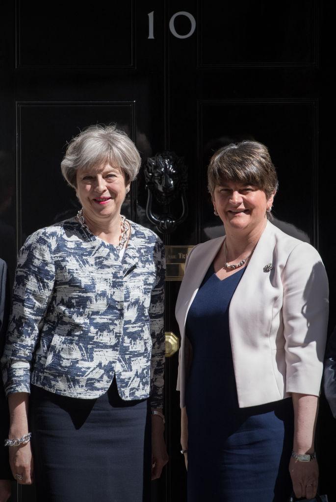 Britain's Prime Minister, Theresa May (L), greets Arlene Foster, the leader of Northern Ireland's Democratic Unionist Party in Downing Street in London, England on June 26, 2017. (Carl Court/Getty Images)