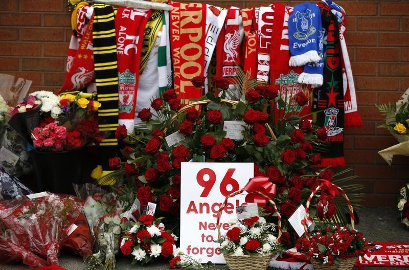 Tributes for the 96 victims of the Hillsborough disaster are seen at Anfield in Liverpool, Britain on April 15, 2016. (REUTERS/Phil Noble)