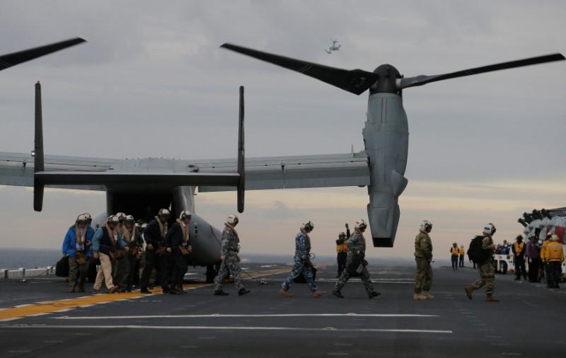 Participants in a ceremony marking the start of Talisman Saber 2017, a biennial joint military exercise between the United States and Australia, arrive on a U.S. Marines MV-22B Osprey Aircraft on the deck of the USS Bonhomme Richard amphibious assault ship off the coast of Sydney, Australia, June 29, 2017. (REUTERS/Jason Reed)