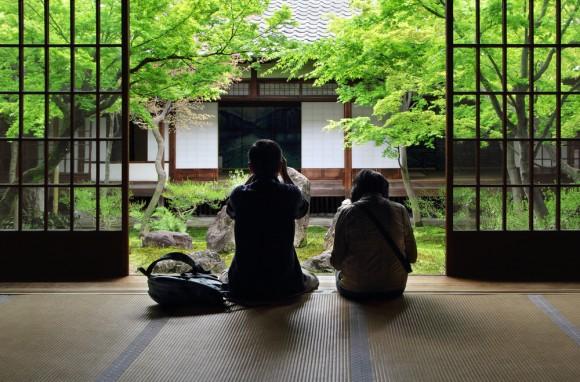 Japanese couple contemplating zen garden in Kyoto (Kennin-ji) Credit: Sergii Rudiuk/Shutterstock