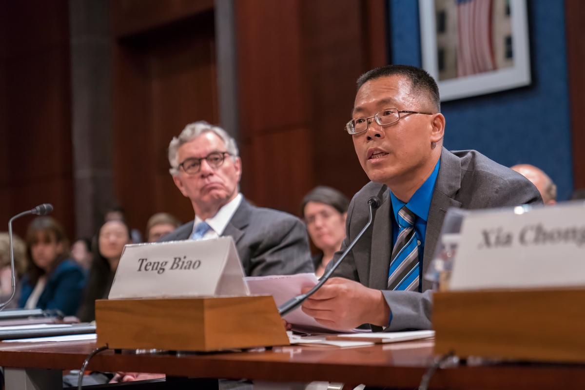 Teng Biao: Dr. Teng Biao, a Chinese human rights lawyer testifies on Wednesday's hearing held by Congressional-Executive Commission on China. (Leo Shi/The Epoch Times)