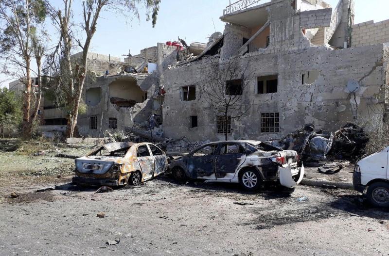 Damaged cars are seen at one of the blast sites in Damascus in this handout picture posted on SANA on July 2, 2017, Syria. (SANA/Handout via Reuters)