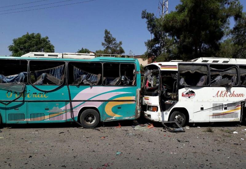 Damaged buses are pictured at one of the blast sites in Damascus in this handout picture posted on SANA on July 2, 2017, Syria. (SANA/Handout via Reuters)