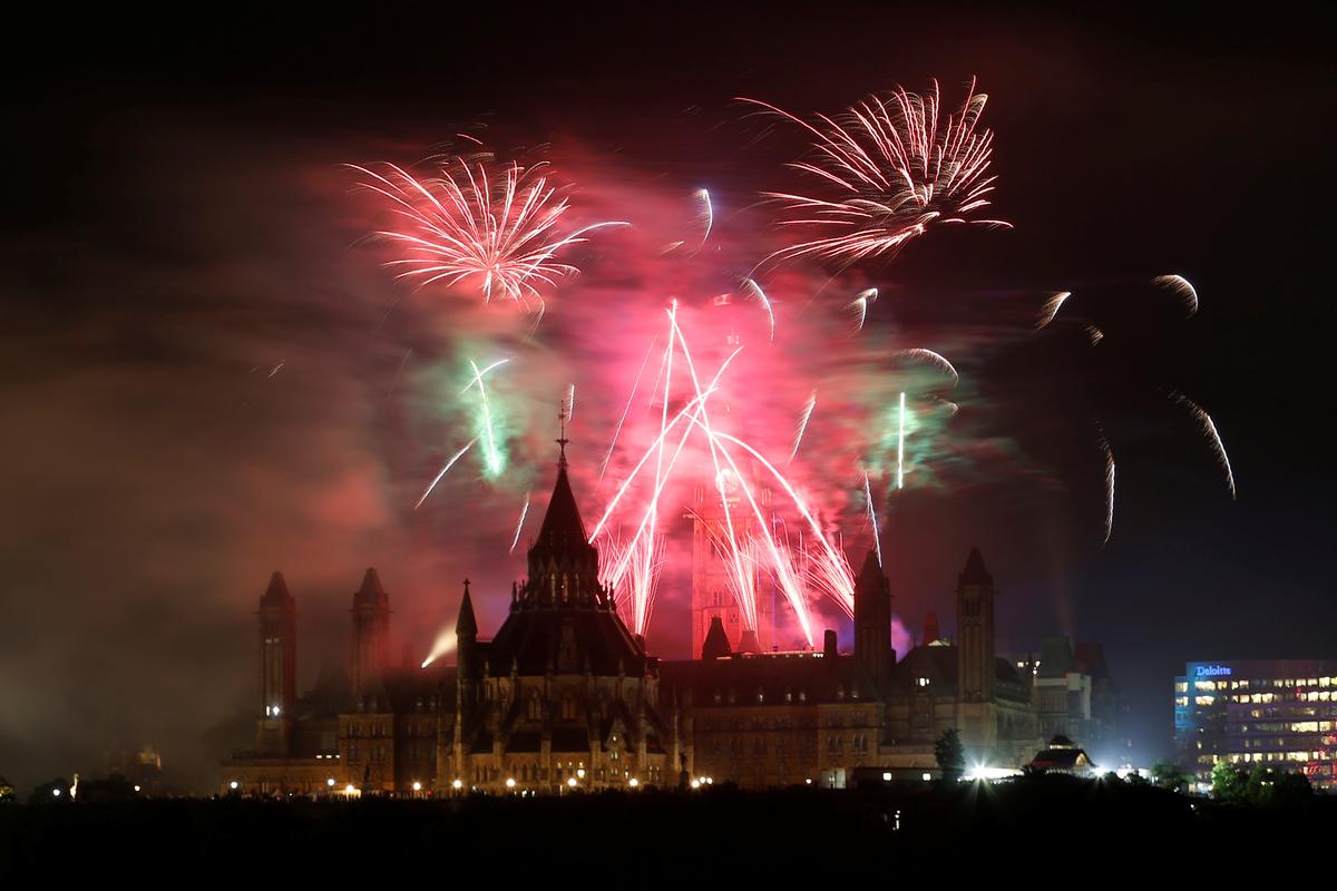 Fireworks explode over Ottawa's Parliament Hill as part of Canada Day celebrations as the country marks its 150th anniversary since confederation, in Gatineau, Quebec, Canada on July 1, 2017. (REUTERS/Chris Wattie.)