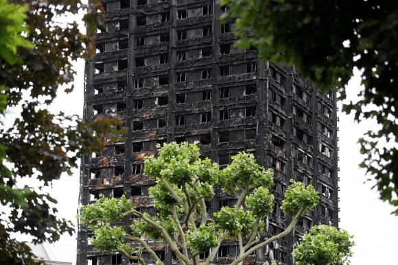 Damage to Grenfell Tower is seen following the fire in London, Britain, June 25, 2017. (Reuters/Peter Nicholls/File Photo)