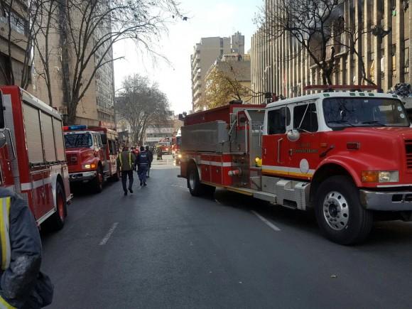 Firefighters truck approaches burning buildings in Johannesburg, South Africa July 5, 2017. (Twitter/@ER24EMS via Reuters)