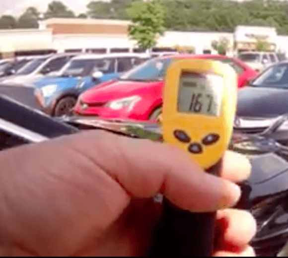 A thermometer reading 167 degrees that a Roswell City police officer in Georgia has just stuck into a car where two dogs had been for over an hour. (Courtesy of Roswell City Police)