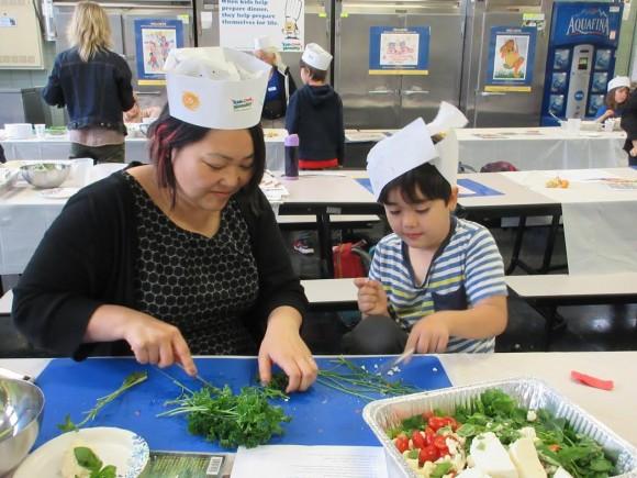 Participants at a recent Family Cooking Night at P.S. 32 (The Kids Cook Monday)