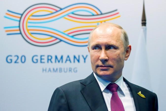 Russian President Vladimir Putin looks on before a meeting at the G-20 summit in Hamburg, Germany, July 8, 2017. (REUTERS/Alexander Zemlianichenko/Pool)