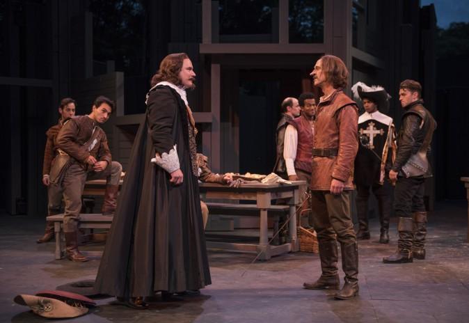 (L–R) The Count de Guiche (John Taylor Phillips), as a worldly cynic plays counterpoint to Cyrano de Bergerac's honor. (Michael Brosilow)