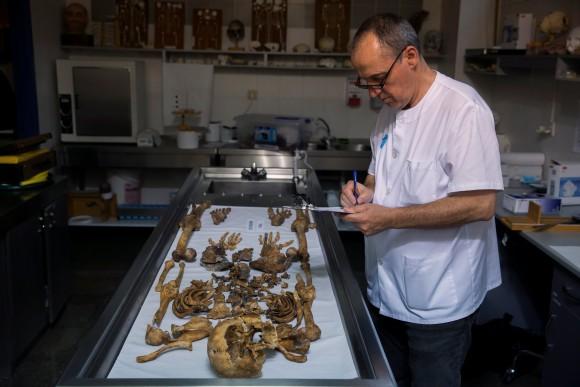 Fernando Serrulla, a forensic anthropologist of the Aranzadi Science Society works at a laboratory in Verin, Spain, June 8, 2017. (Reuters/Juan Medina)