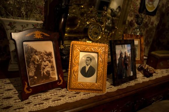 A portrait of Rafael Martinez (C), one of those were killed by forces of the dictator Francisco Franco in 1936 in the area known as La Pedraja, is seen among other portraits at family home in Briviesca, Spain, June 23, 2017. (Reuters/Juan Medina)