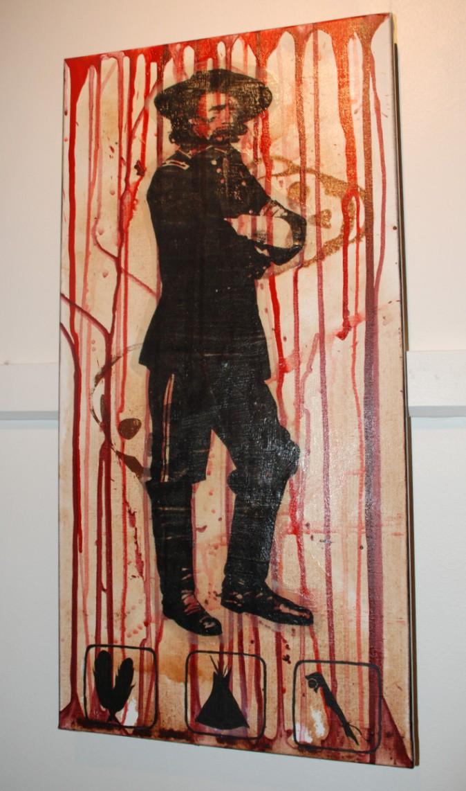 Picture of defaced George Armstrong Custer covered with blood. (Myriam Moran copyright 2014)