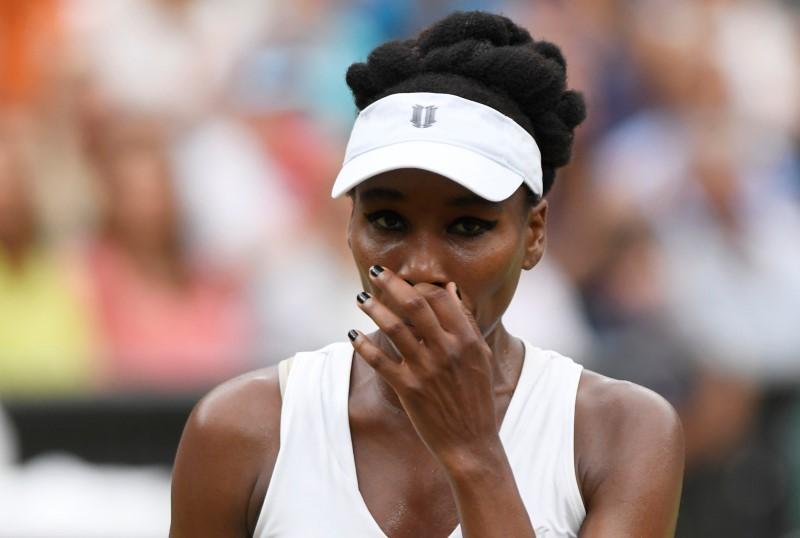 Tennis - Wimbledon - London, Britain - July 15, 2017 Venus Williams of the U.S. reacts during the final against Spain's Garbine Muguruza REUTERS/Tony O'Brien