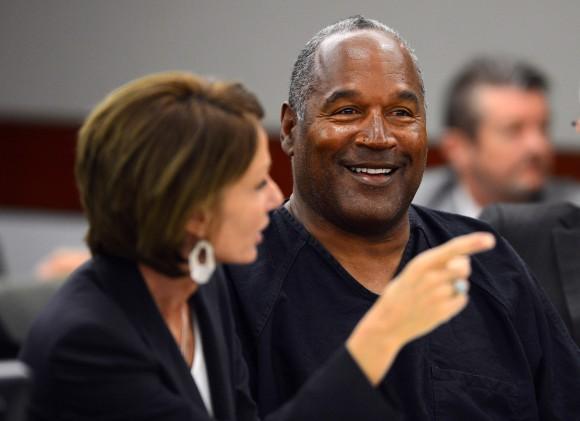 O.J. Simpson with his defense attorney Patricia Palm at the end of an evidentiary hearing in Clark County District Court on May 17, 2013, in Las Vegas, Nevada. (Photo by Ethan Miller/Getty Images)