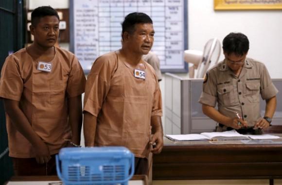 FILE PHOTO: Lieutenant-General Manas Kongpan, a suspected human trafficker, walks near a prison cell at the criminal court in Bangkok, Thailand, March 15, 2016. (Reuters/Chaiwat Subprasom/File Photo)