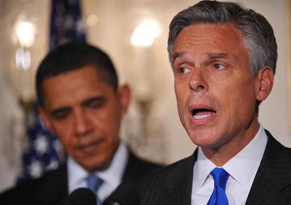 FILE PHOTO: Utah Governor Jon Huntsman speaks as US President Barack Obama looks on in the Diplomatic Reception Room of the White House May 16, 2009 in Washington, DC. Obama nominated Huntsman as the next US ambassador to China. (MANDEL NGAN/AFP/Getty Images)