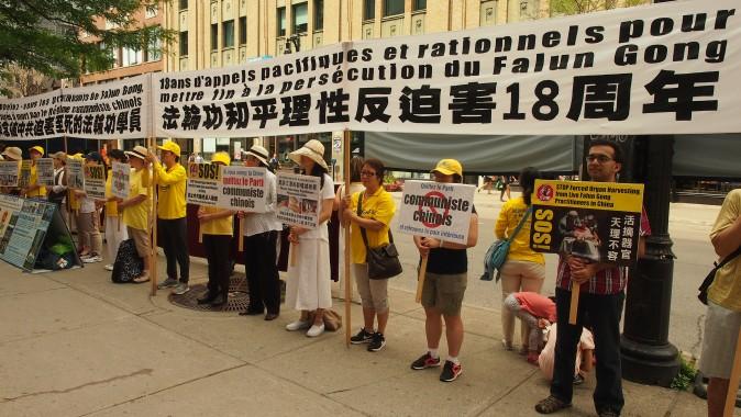 Falun Gong adherents hold an event in front of the Chinese Consulate in Montreal on July 19, 2017, to mark 18 years since the persecution of their spiritual practice was launched by the Chinese regime on July 20, 1999. (Nathalie Dieul/The Epoch Times)