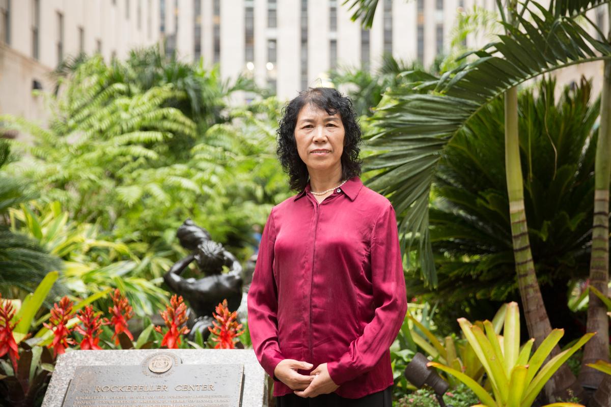 Li Guiqin at Rockefeller Center in New York on July 14, 2017. Back in China, Li phoned Chinese public security officials every day, calling on them to stop abetting the persecution of Falun Gong. (Benjamin Chasteen/The Epoch Times)