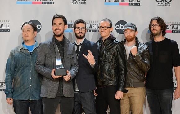 (L-R) Joe Hahn, Mike Shinoda, Brad Delson, Chester Bennington, Dave Farrell, and Rob Bourdon of Linkin Park with the Favorite Alternative Artist award in the press room at the 40th American Music Awards held at Nokia Theatre L.A. Live on Nov. 18, 2012, in Los Angeles, Calif. (Jason Merritt/Getty Images)