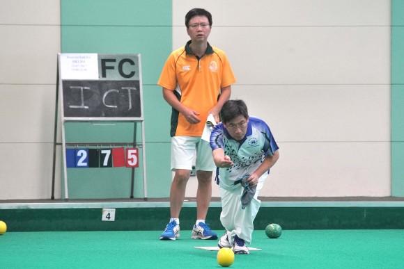 Hong Kong Football Club bowler CT Wong (delivering) on the way to defeating Imen Tang from Craigengower Cricket Club to win his first National Indoor Singles trophy last Saturday, July 15, 2017. The match is\was also the last game the green hosted before being closed for refurbishment. (Mike Worth)
