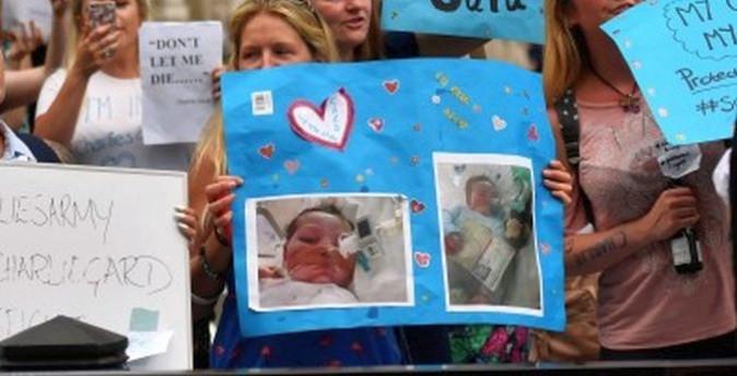 People gather in support of continued medical treatment for critically-ill 10-month old Charlie Gard in London on July 6, 2017. (Ben Stansall/AFP/Getty Images)