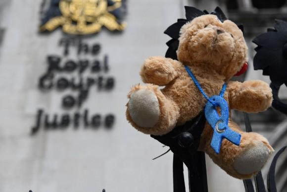 A picture shows a teddy bear set up by supporters of the family of British baby Charlie Gard outside the Royal Courts of Justice in London on July 24, 2017. (CHRIS J RATCLIFFE/AFP/Getty Images)