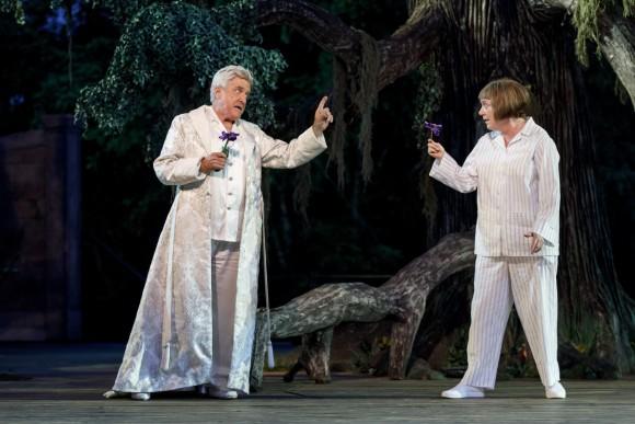 Oberon, king of the fairies (Richard Poe), commands Puck (Kristine Nielsen) to use the magical juice from the flower to cast a spell on his wife Titania. (Joan Marcus)