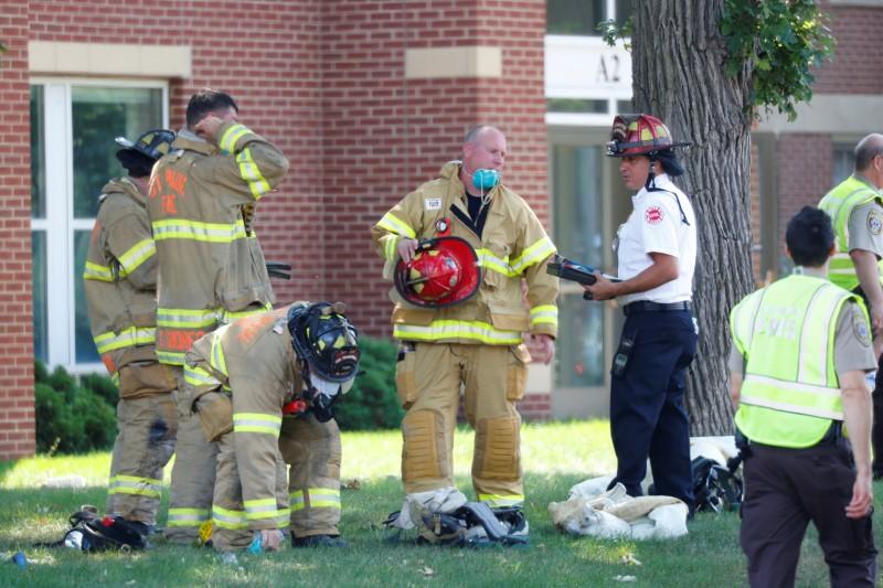 Emergency personnel work at the scene of school building collapse at Minnehaha Academy in Minneapolis, Minnesota on Aug. 2, 2017. (REUTERS/Adam Bettcher)
