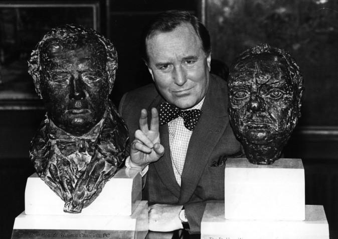 Robert Hardy, actor, chosen to portray Winston Churchill in a television series, between two busts of Churchill on June 3, 1980. (Geoff Bruce/Central Press/Getty Images)