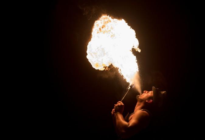 Fire eater Antonio Russell performs in Big Top at the Gerry Cottle's Magic Circus in Devon, England, on August 1, 2017. (Matt Cardy/Getty Images)