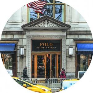 People walk by Ralph Lauren's flagship Fifth Avenue Polo store in New York City on April 4. (GETTY IMAGES)