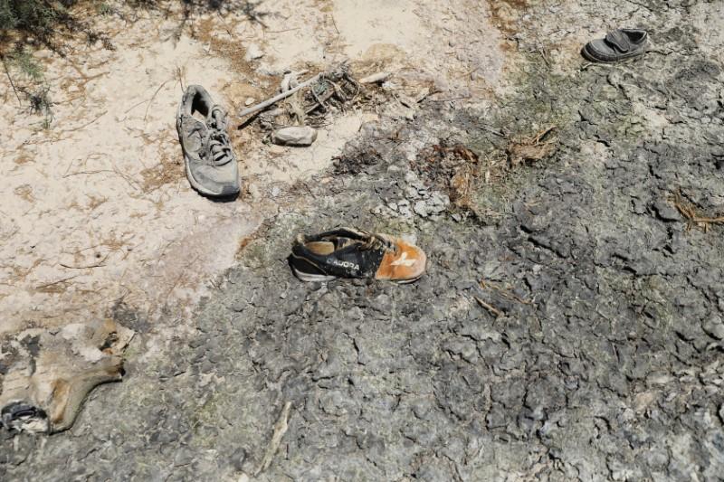A mix of garbage and sewage is seen on the ground of the estuary of the Kidron Valley close to where it leads into the Dead Sea in the West Bank August 2, 2017. (REUTERS/Ammar Awad)