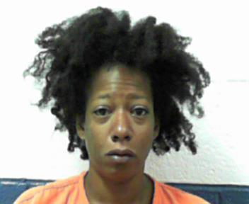 Erica Newsome, who was arrested after police found her 11-year-old daughter's body dumped off the side of a road in West Viginia. (WVRJA)