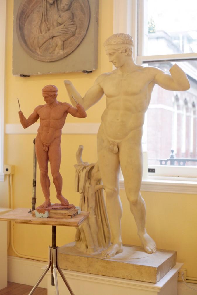 Charlie Mostow's copy (L) of a cast of the Diadumenos by Polycletus (5th Century BCE) at the Institute of Classical Architecture and Art in New York. (Courtesy of Charlie Mostow)