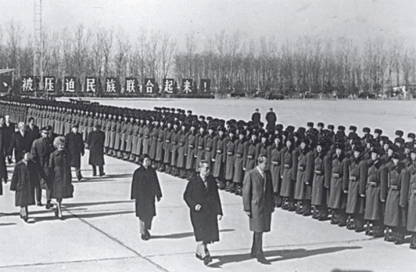 President Richard Nixon (R) and Chinese Premier Zhou Enlai inspect the honor guard at the Beijing Capital Airport on Feb. 22, 1972. (KEYSTONE/GETTY IMAGES)