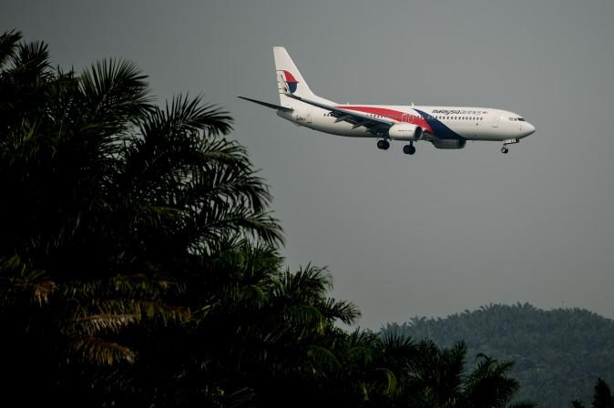 A Malaysia Airlines plane prepares for landing at the Kuala Lumpur International Airport in Sepang, outside Kuala Lumpur on July 21, 2014. (Mohd Rasfan/AFP/Getty Images)