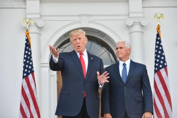 President Donald Trump and Vice President Mike Pence speak to the press on Aug. 10, 2017, at Trump's Bedminster National Golf Club in New Jersey before a security briefing. (Nicholas Kamm/AFP/Getty Images)