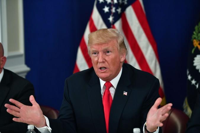 US President Donald Trump during a security briefing on Aug. 10, 2017, at his Bedminster National Golf Club in New Jersey. Trump said the expulsion of U.S. diplomats from Russia will save the U.S. money. (Nicholas Kamm/AFP/Getty Images)