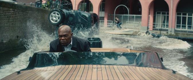 Darius Kincaid (Samuel L. Jackson) pilots a speedboat down a dutch canal, in "The Hitman's Bodyguard." (Summit Entertainment and Millennium Media)