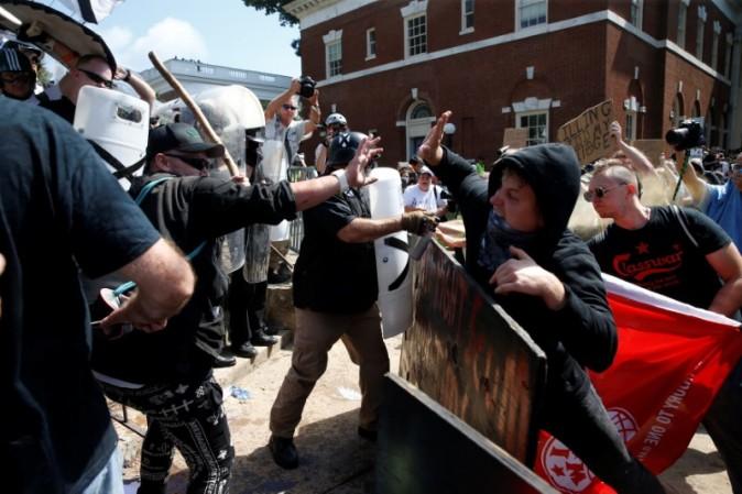 Members of white nationalists clash against a group of counter-protesters in Charlottesville, Virginia, U.S., August 12, 2017. REUTERS/Joshua Roberts