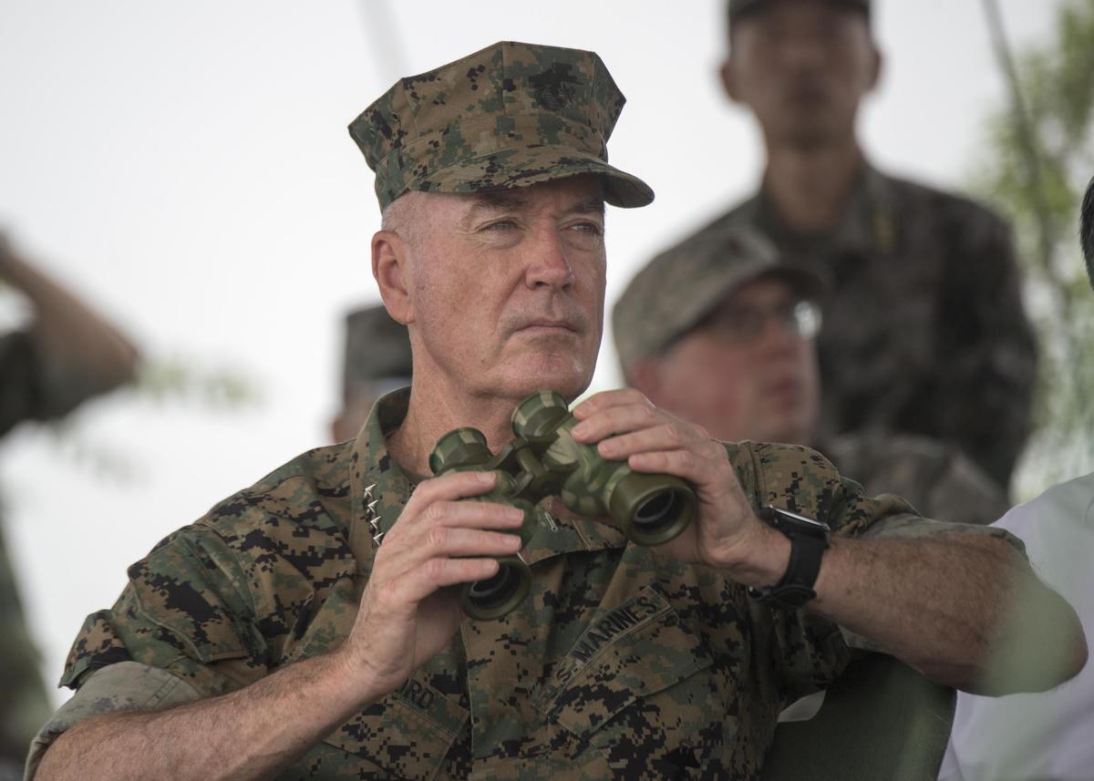 Marine Corps Gen. Joe Dunford, chairman of the Joint Chiefs of Staff, observes an attack exercise by Chinese troops at a Chinese army base in Shenyang, China, Aug. 16, 2017. (DoD photo by Navy Petty Officer 1st Class Dominique A. Pineiro)
