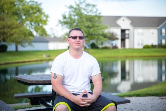 Kris Thomas, 30, outside his home in Hilliard, Ohio, on July 31. (Benjamin Chasteen/The Epoch Times)