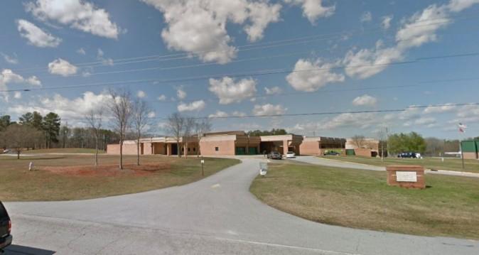 The teacher was described as an 18-year employee at the school. He was taken from the school to a hospital via helicopter. (Google Street View)