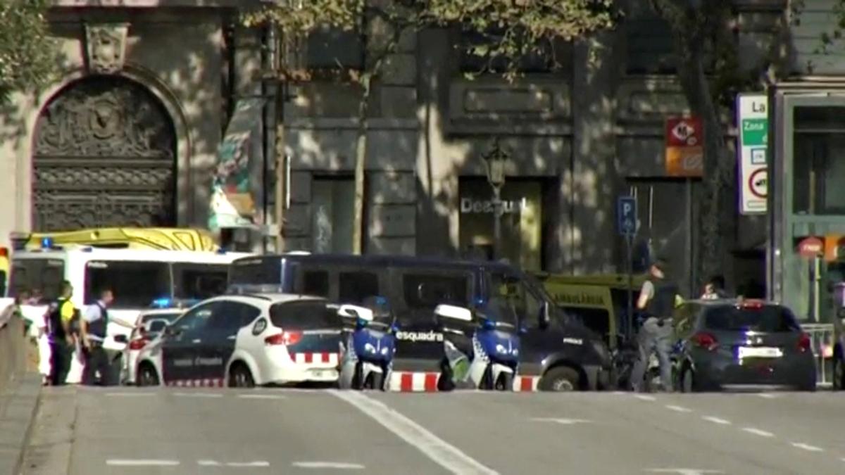 A still image from video shows a police cordon on a street in Barcelona, Spain following a van crash August 17, 2017. (REUTERS TV via REUTERS)